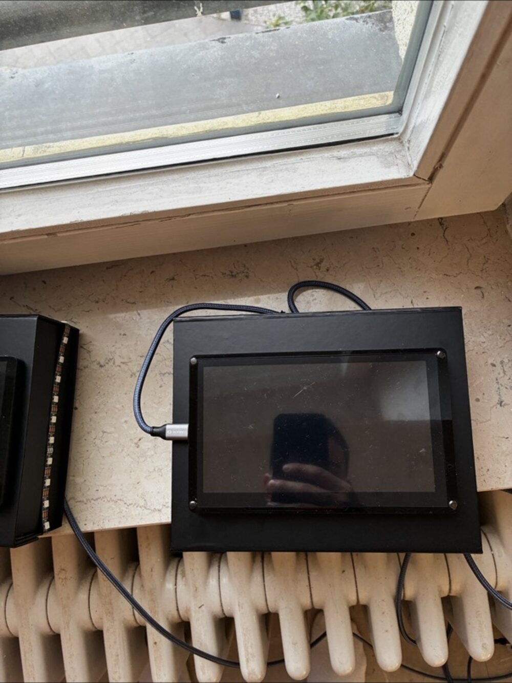 A prototype unit wired up on the windowsill